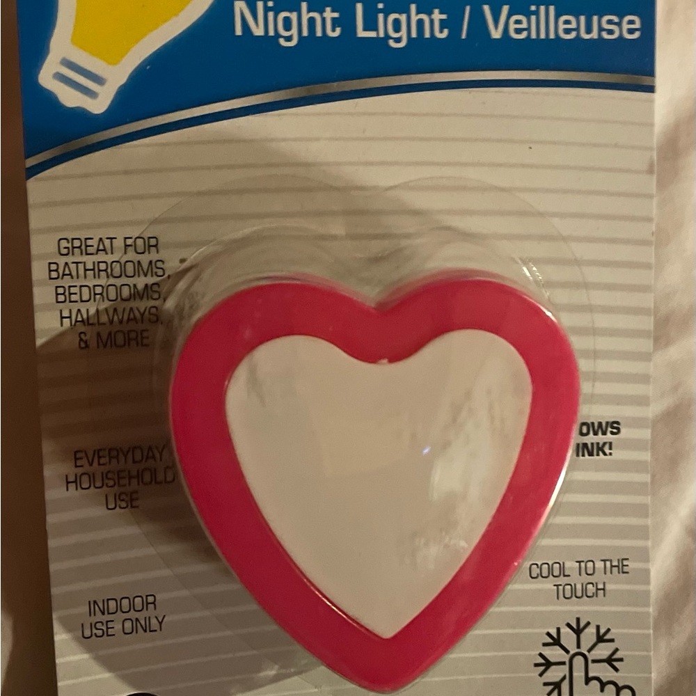 Pink heart shaped LED plug in light